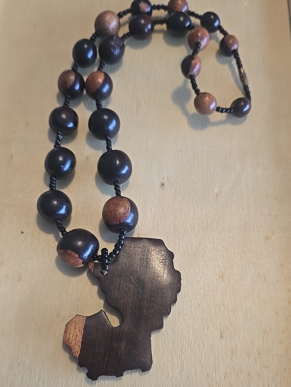 Handcrafted Wooden Black and Brown Beaded Necklace with Silhouette Pendant